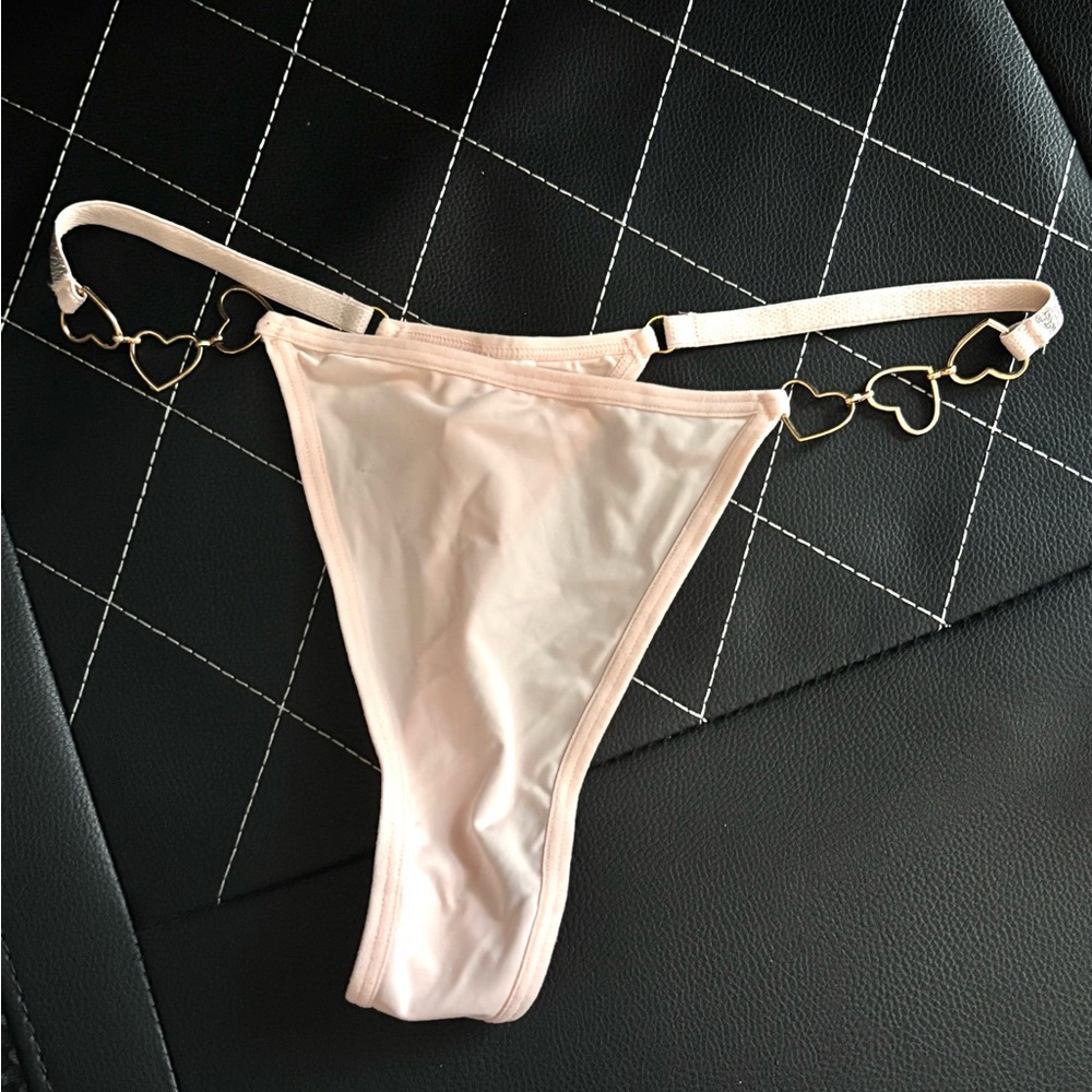 Pink thong with gold heart straps